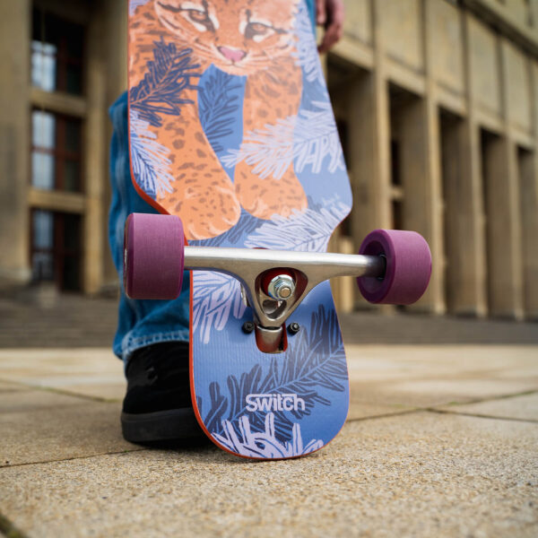 Switch twin v2 ocelot drop-through longboard tail closeup