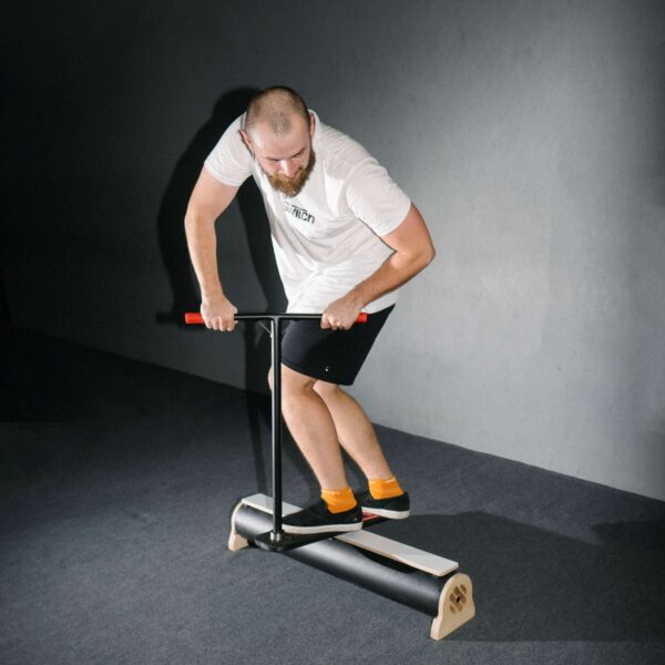 Switch Trampoline Training trick scooter grind training with rail / box obstacle lifestyle photo