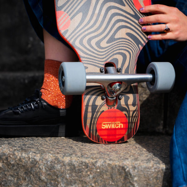 Switch Twin v2 Swirl Drop-through longboard tail closeup