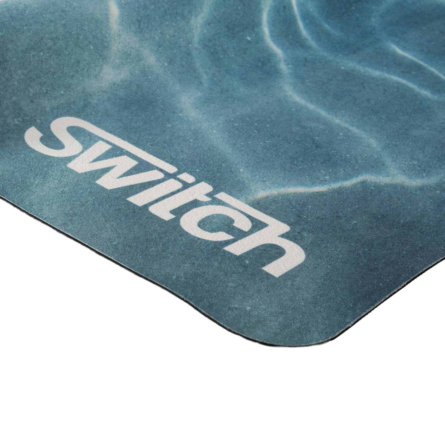 Switch Training Mat Small — close-up of blue surface and logo